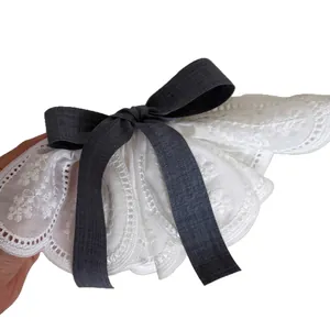 French romantic lace hair clip with embroidery and a charcoal gray decorative bow