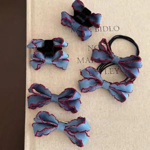 Denim bow hair accessory set with blue fabric and red scalloped stitching, 6-piece kit