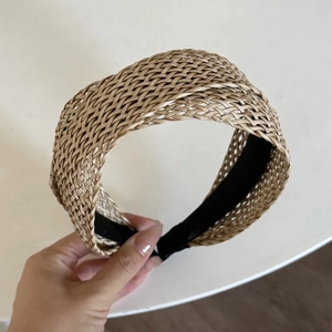 Bohemian style straw woven wide headband in champagne gold for women on white background