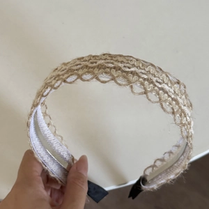 Detail of woven bohemian headband showing straw texture and non-slip inner lining