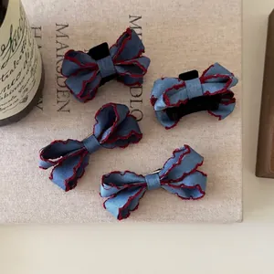Retro denim hair clips set with blue fabric and red wavy lace edges for women