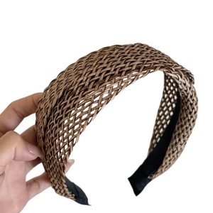 Bohemian style brown woven straw headband for women with wide lattice design