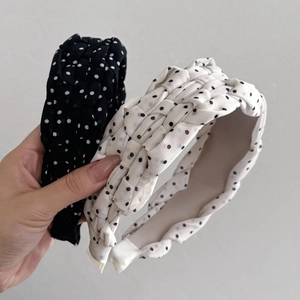 Polka dot pleated wide headbands in black and white woven design for elegant hair styling