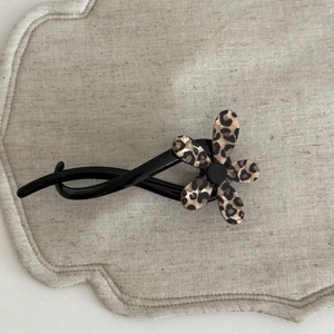 French leopard print flower banana hair clip in black glossy resin for elegant styling