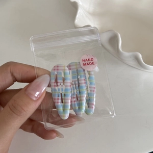 Three-piece set of cute blue and pink checkered BB hair clips in handmade packaging