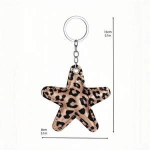 Leopard print star keychain made of faux leather with silver ring, size 13cm x 8cm