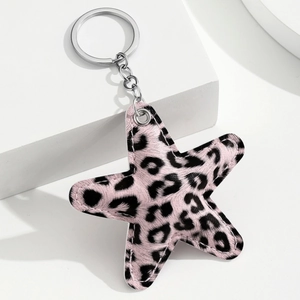 Pink leopard print star keychain made of PU leather with a silver metal ring accessory