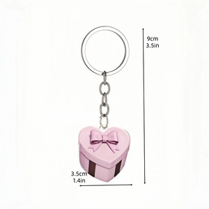 Pink heart gift box acrylic keychain pendant with silver metal ring on white background