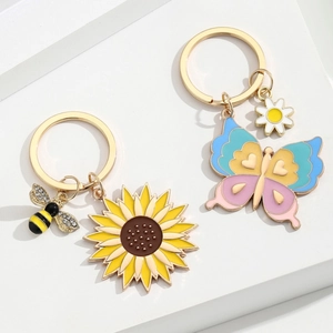 Mignon Porte-clés en Alliage Émaillé Doré Papillon Tournesol Abeille Marguerite Pendentif de Sac pour Femme Fille Cœur