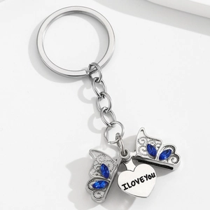 Porte-clés papillon argenté avec strass bleus et pendentif cœur I Love You