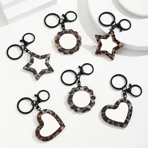 Sublimatie sleutelhangers in hart- en stervorm met luipaardprint voor DIY-bedrukking
