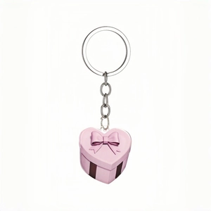 Pink heart-shaped gift box acrylic keychain with a bow and silver metal ring