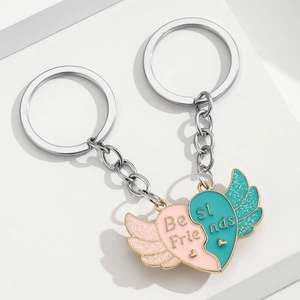 Détail de porte-clés Best Friends cœur brisé avec ailes à paillettes et aimants
