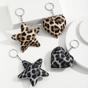Leopard print star and heart faux leather keychain charms with silver metal rings