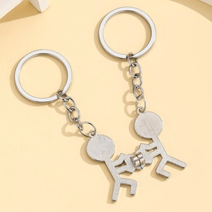 Funny matchstick men magnetic couple keychain with heart gesture in silver metal finish