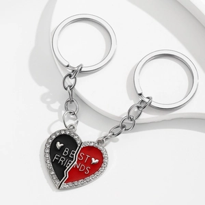 Pair of heart-shaped Best Friends keyrings with crystal rhinestones and enamel inlay