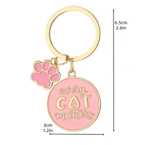 Cute gold-plated alloy cat keychain with pink paw charm and every CAT matters enamel tag