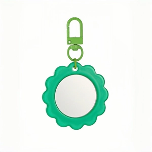 Green sunflower pocket mirror with metal clip for portable makeup and styling