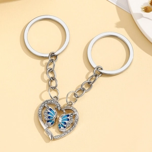 Portachiavi puzzle a cuore con farfalla argentato per coppie con strass e incisione Best