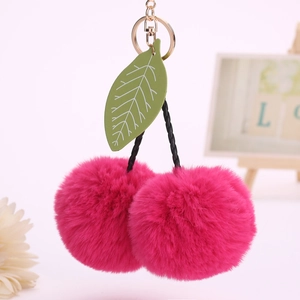Cute cherry faux fur pompom keychain with green leaves and golden metal clasp for bags