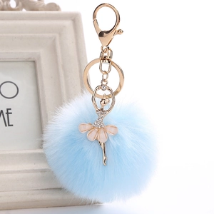 Cute ballet dancer keychain with blue faux fur pompom and sparkling crystal rhinestones