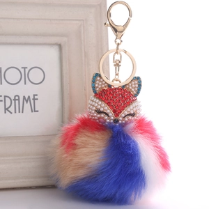 Fuchskopf Schlüsselanhänger mit glitzernden Strasssteinen und buntem Pelzbommel
