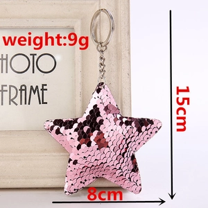 Détail d'un porte-clés étoile à paillettes roses de 15 cm avec dimensions précises