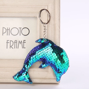 Portachiavi delfino con paillettes reversibili e sfumature blu per borse e auto