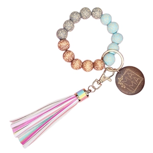 Portachiavi bracciale con perline leopardate, ciondolo MAMA in legno e nappa