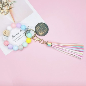 Bracelet porte-clés MAMA en perles de silicone avec pompon et breloque en bois