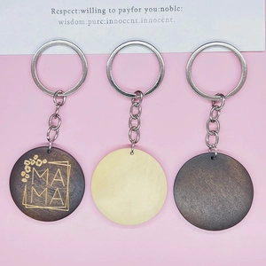 Custom MAMA wooden keychain set with round pendants on pink background and card