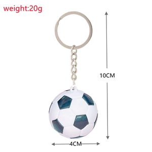 Detail view of soccer keychain showing 10cm total length and 4cm ball diameter