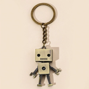 Vintage movable alloy robot keychain with metallic bronze finish for car keys and bags