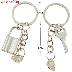 Detailed size and weight view of silver metal lock and key magnetic couple keychain set