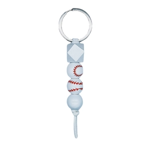Detail of baseball theme keychain featuring white printed wood beads and red stitch patterns