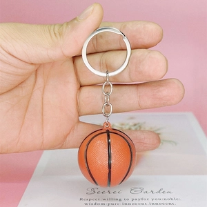 Creative orange basketball keychain with realistic texture and silver metal chain accessory