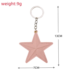 Porte-clés étoile en cuir PU rose avec anneau argenté dimensions 13cm de long et 7cm de large