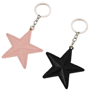 Porte-clés en cuir en forme d'étoile rose et noir avec des surpiqûres blanches élégantes