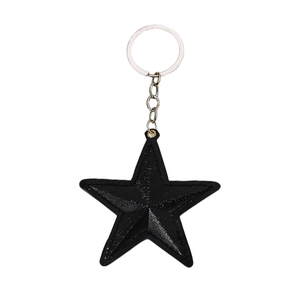 Porte-clés étoile en cuir noir minimaliste avec anneau en métal et fini texturé