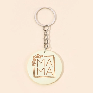 Vue détaillée du porte-clés MAMA rond beige en acrylique avec anneau et chaîne en argent