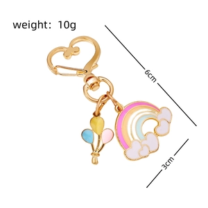 Detailed view of rainbow balloon keychain with dimensions 6cm x 3cm and 10g weight