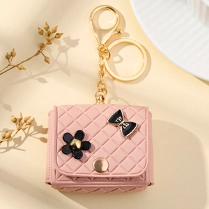 Pink quilted leather mini bag keychain earphone case with gold hardware and floral charm