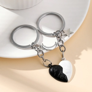 Magnetic black and white heart couple keychain set with star and moon charms