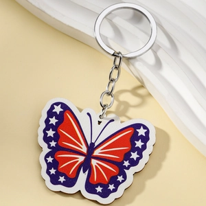 Wooden butterfly keychain pendant featuring American flag pattern with metal ring