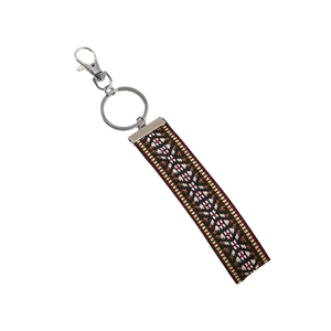 Ethnic style woven wristlet keychain with geometric patterns and metal lobster clasp