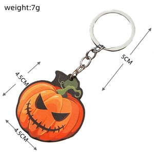 Halloween pompoen sleutelhanger met oranje hanger en afmetingen 4,5cm en 7g gewicht