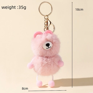 Close-up of pink plush bear keychain showing 18cm height and 8cm width dimensions