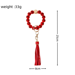 Porte-clés bracelet en perles rouges avec papillon, gland en cuir et dimensions