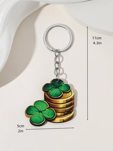 Detailed view of St. Patrick’s Day keychain with green shamrock and lucky gold coins