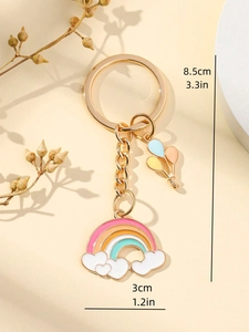 Detail view of colorful rainbow and cloud keychain with balloon charms and measurements